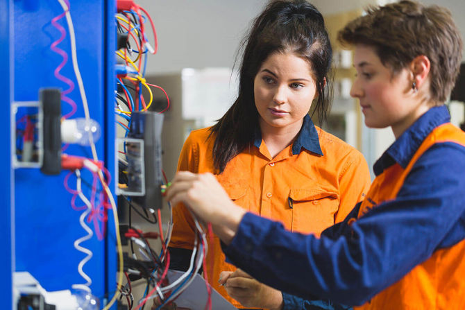 2 Apprentices Working